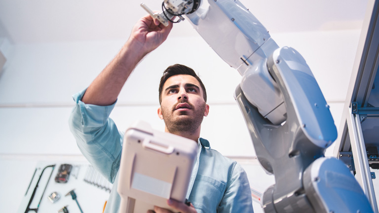 Person working with robotics